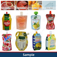Machine de remplissage bouchage de poche à bec automatique Doypack machine de remplissage de jus de fruits pour sacs à bec