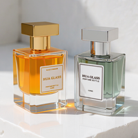 Bouteille de parfum à sertir unique personnalisée pour hommes Bouteilles vides de parfum de 100ml Bouteille de parfum en verre de luxe carrée transparente de 50ml avec bouchon en zamac