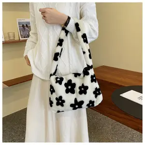 2022 autumn and winter new style cute black and white flowers plush women one-shoulder messenger bag