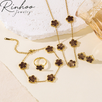 Ensemble de bijoux cinq pièces en acier inoxydable pour femme, motif fleur à cinq trèfles, style INS, comprenant collier, bracelet et boucles d'oreilles, tendance, transfrontalier