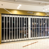 Porte accordéon transparente en polycarbonate pour devanture de magasin, moderne, avec cadre en alliage d'aluminium manuel