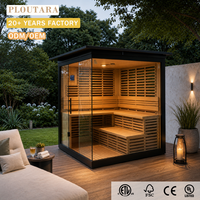 Sauna extérieur panoramique en verre PLOUTARA, écologique, en hemlock, design moderne, structure en aluminium noir, banc d'angle, idéal pour la salle de sport ou la villa.