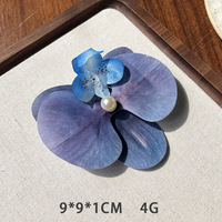 Barrettes à fleurs Phalaenopsis tendance 2026 pour femmes – Élégante pince à cheveux latérale pour séances photo et tenues de vacances