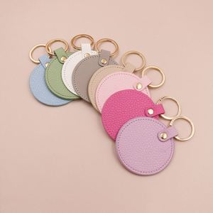 Porte-clés rond en cuir PU avec impression en relief, style mignon, durable et doux pour femmes - Cadeaux promotionnels - Product Image 1