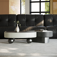 Ensemble de tables basses gigognes modernes avec plateau en pierre frittée travertin, table d'appoint en placage de bois noir avec tiroir