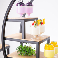 Support de présentation de buffet moderne à plusieurs niveaux en acier inoxydable et en bois pour la restauration hôtelière, les mariages, les événements, la présentation des aliments