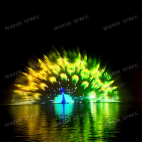 Fontaine de projection d'eau sur grand écran personnalisée avec lumière laser couleur pour projets de paysagisme nocturne et de visites panoramiques