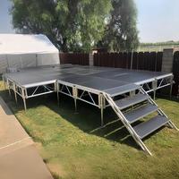 Plateforme de scène modulaire portable en aluminium avec escaliers, capacité de charge lourde de 1000 kg, installation rapide pour la location d'événements et les concerts