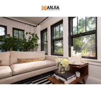 Ventana Corredera Vertical de Aluminio con Marco Negro y Doble Acristalamiento con Rejilla