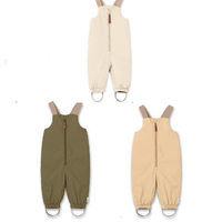 Vente en gros de vêtements pour enfants Vêtements d'hiver pour enfants Combinaison imperméable à l'eau Bretelles pour garçons et filles Salopette de neige épaisse et solide