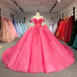 Vestido de Quinceañera Jancember 8566 Popular Color Fucsia con Hombros Descubiertos y Lazo - Product Image 1