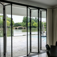Puertas Corredizas de Vidrio Templado Doble de Alta Calidad para Balcón, Bi-Plegables, Modernas, de Aleación de Aluminio, Acabado de Fábrica, Aislamiento Acústico