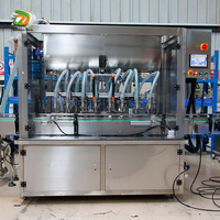 Machine de remplissage de pâte à piston automatique à haute viscosité Machine de remplissage de bouteilles de sauce au chocolat pour aliments en conserve pour animaux de compagnie