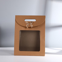 Vente en gros de sac à main de haute qualité avec fenêtre transparente et nœud sac de cadeau de fête avec ruban sac à main de cadeau pour shopping