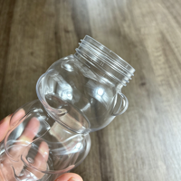 Bouteilles de thé au lait jetables en PET transparentes en forme de petit ours de 350 ml et 500 ml avec couvercle en aluminium et bouchon à vis pour café