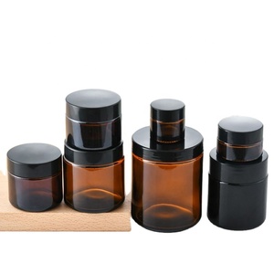 Conteneur personnalisé pour soins de la peau 5 10 15 20 ml 30 50 100 g Pot en verre rond ambré avec couvercles - Product Image 1