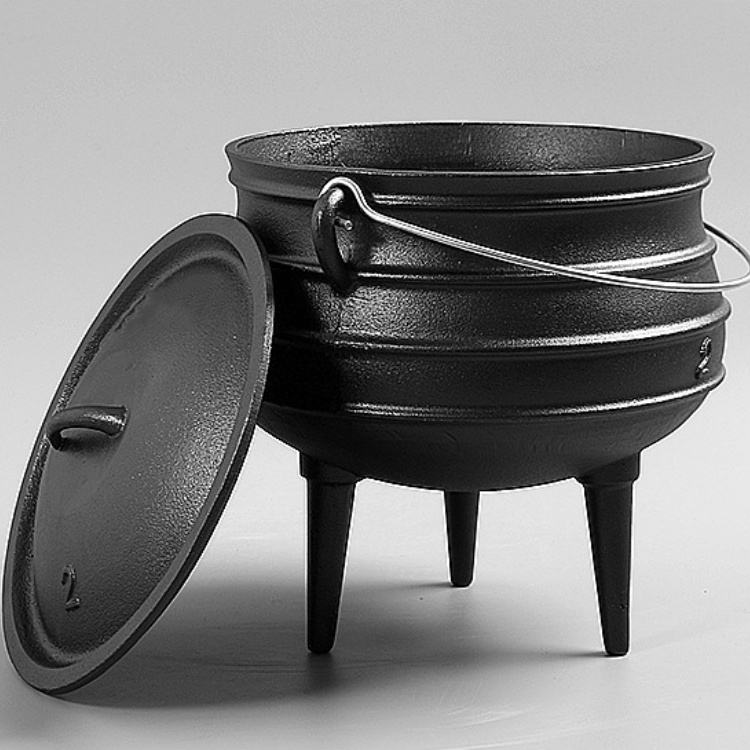 Cast Iron Cookware An Empty Dutch Oven Stewing Pot Resting On A