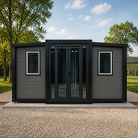 Maison conteneur pliable extensible gris foncé pour le glamping et l'hébergement temporaire