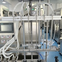 Prix bon marché 4 têtes pompe magnétique entièrement automatique voiture verre eau lait Essence sérums Oral liquide bouteille machine de remplissage à vendre