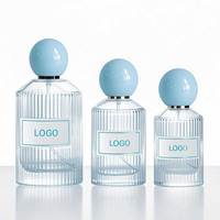 En stock flacons de parfum en verre ronds roses et bleus de luxe de 30 ml 50ml 100ml flacon de parfum clair vide personnalisé avec boîte d'emballage