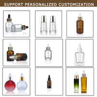 Vente en gros, flacon compte-gouttes cosmétique vide en verre transparent de 30ml, flacon de sérum d'huile essentielle avec compte-gouttes