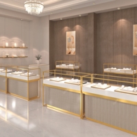 Vitrine à bijoux en or sur pied personnalisée en acier inoxydable avec éclairage LED pour magasin de bijoux