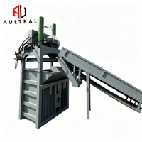 Presse à balles hydraulique verticale industrielle avec convoyeur pour les applications de recyclage du papier, du carton, du plastique et des déchets.