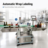 Machine d'étiquetage automatique YN801C pour bouteilles rondes dans l'industrie alimentaire (eau, vin rouge)