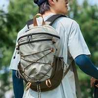 Sac à dos de randonnée multifonctionnel pour l'extérieur avec système de fixation par cordon élastique pour le trekking et le camping