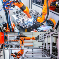 Robot de soldadura KUKA con escaneo láser, programación de rieles para tanques de fibra, soldadura sin operador, brazo articulado para soldadura robótica