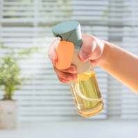 Botol Semprot PET Kosong Bentuk Bulat Transparan Mewah dengan Pompa Minyak, Ukuran 200ml 300ml 500ml, Logo Custom, Laris Manis