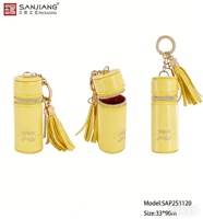 Pochette de rangement cylindrique de luxe avec pompon et porte-clés, mini pochette portable en cuir PU pour usage quotidien