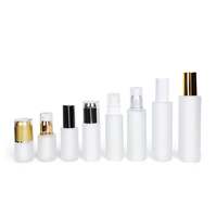 Vente en gros de flacons de lotion pour le corps en verre transparent de 100 ml, 120 ml et 30 ml avec pompe en plastique rose pour l'emballage des soins de la peau