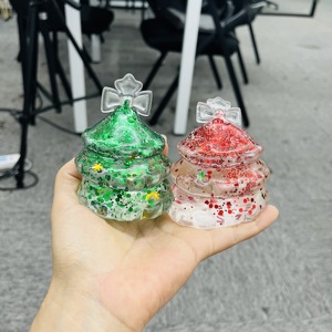 Entrepôt USA : Lot de 72 jouets de Noël scintillants 4 couleurs, en forme d'arbre, rembourrés au maltose, à remontée lente, anti-stress, avec boîte - Product Image 4