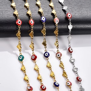 สร้อยคอสแตนเลสสตีลขนาด 6 มม. สำหรับผู้หญิง สีทอง ลายหัวใจแบบนูน พร้อมจี้รูปตาปีศาจแบบตุรกี ประดับลูกปัดโลหะ สร้อยคอแบบโชคเกอร์ - Product Image 1