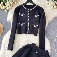 Costume deux pièces Tenue de jeunesse pour femme Cardigan en tricot et jupe courte polyvalente pour femme Ensemble 2 pièces décontracté pour femme