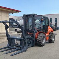 Chariot élévateur tout-terrain pour la construction - Soulève des blocs de béton et des barres d'armature