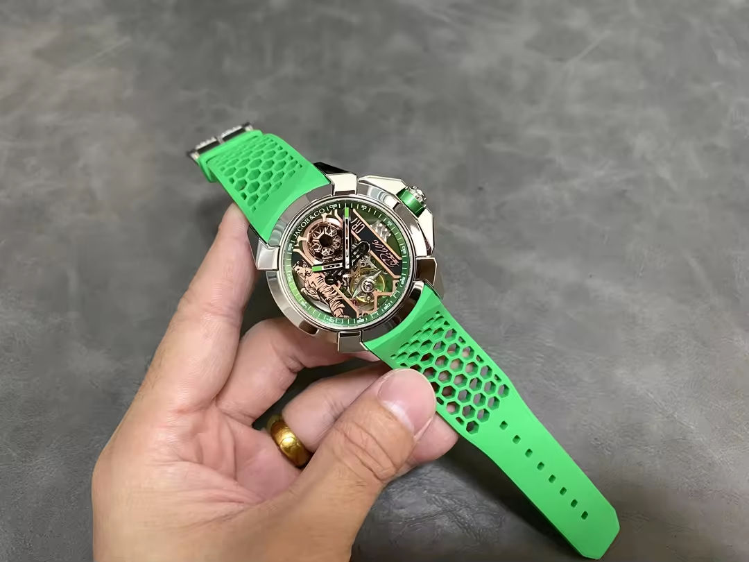 silver case green strap