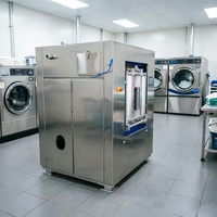 Laveuse-essoreuse industrielle à cycle continu de 50 kg avec barrière sanitaire pour les établissements de santé