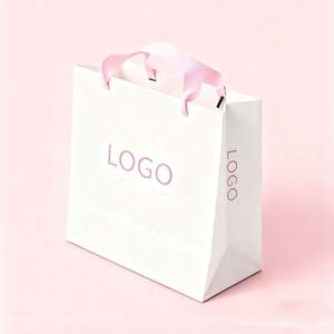 Prix d'usine, vente en gros, sac d'emballage en papier blanc avec ruban rose, logo personnalisé - Product Image 1
