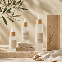 Vente en gros de flacons compte-gouttes en verre givré de 20 à 100 ml avec bouchon en bambou pour sérum facial, huile essentielle, emballage de produits de soin de la peau