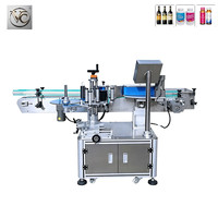 Machine d'étiquetage automatique de bouteilles rondes FKJX avec capteur d'étiquettes pour le collage d'étiquettes sur les bouteilles de jus et de miel