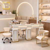 Table de manucure de luxe avec armoire de rangement multi-compartiments et trou pour câbles réservé pour studio de manucure commercial