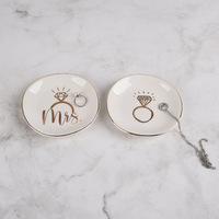 Vente en gros Assiette à bijoux en céramique moderne personnalisée avec bordure dorée Plateau à vaisselle pour présentoir à bagues avec logo personnalisé