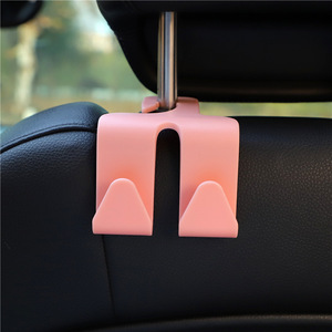 Gancho de almacenamiento de doble cabezal para el respaldo del asiento del coche, material ABS rosa, para la organización del interior del coche - Product Image 1