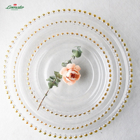 LOMATO OEM ODM Assiettes en porcelaine dorée transparentes écologiques et durables pour mariage, assiettes de présentation argentées perlées, vaisselle moderne en gros