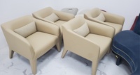 Fauteuil convertible de loisirs entièrement recouvert de cuir avec coussin pour salon, appartement et hôtel