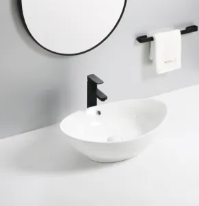 Benzersiz modern el yapımı çin lüks fantezi oval tasarımlar masa üstü küçük banyo kase lavabo tezgah üstü sanat seramik lavabo