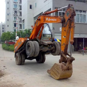 Excavatrice sur pneus Hitachi EX100WD d'occasion fabriquée au Japon à vendre Excavatrice sur pneus Hitachi 100 d'occasion en bon état - Product Image 1