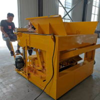 Machine de fabrication de blocs de béton mobile Machine de fabrication de blocs de ponte d'œufs de style mobile QMJ-6A Machine de ponte de blocs sans palette